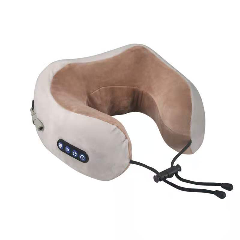 Massage pillow with beige and white design on a white background